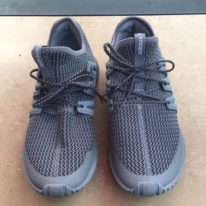 Grey Adidas tennis shoes